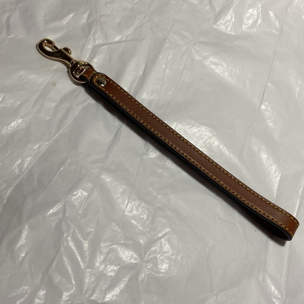 NWOT Dooney & Burke leather wristlet strap